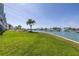 Expansive grassy area offering scenic waterfront views at 340 Pinellas Bayway S # 306, St Petersburg, FL 33715