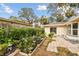 Landscaped backyard with patio and garden at 356 Grand Central Ave, Safety Harbor, FL 34695