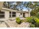 Stone patio adjacent to the house at 356 Grand Central Ave, Safety Harbor, FL 34695