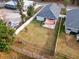 Aerial view of fenced backyard with patio and shade sail at 37137 Florida Ave, Dade City, FL 33525