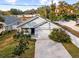 Aerial view of a newly built home with a spacious backyard and driveway at 37137 Florida Ave, Dade City, FL 33525