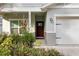 Inviting front door entrance with unique address marker at 37137 Florida Ave, Dade City, FL 33525