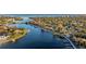 Aerial view showcasing waterfront property and surrounding neighborhood at 400 22Nd Ne Ave, St Petersburg, FL 33704