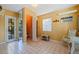 Small bathroom with tiled floor and shower at 400 22Nd Ne Ave, St Petersburg, FL 33704