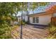 Wooden deck overlooking a beautifully landscaped backyard at 400 22Nd Ne Ave, St Petersburg, FL 33704