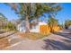 Home exterior showcasing a white facade and wooden fence at 400 22Nd Ne Ave, St Petersburg, FL 33704