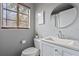 Clean bathroom with a single vanity and updated fixtures at 4008 W North B St, Tampa, FL 33609