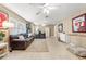 Bonus room with leather couch and home gym area at 418 S Albany Ave, Tampa, FL 33606