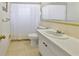 Clean bathroom with bathtub, toilet, and white vanity at 4308 Craftsbury Dr, New Port Richey, FL 34652