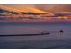 Scenic sunset over calm ocean waters with a pirate ship at 450 Gulfview S Blvd # 1708, Clearwater, FL 33767