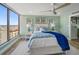 Bedroom with city views, hardwood floors, and a queen bed at 450 Gulfview S Blvd # 1708, Clearwater, FL 33767