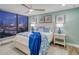 Bedroom with city views and a comfortable queen bed at 450 Gulfview S Blvd # 1708, Clearwater, FL 33767