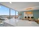 Modern kitchen with white island, quartz countertops, and city views at 450 Gulfview S Blvd # 1708, Clearwater, FL 33767