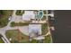 Bird's-eye view of a house and its surroundings, including a waterfront location at 4536 Heavens Way, New Port Richey, FL 34652