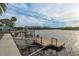 Wooden dock extending into the water, offering access to the waterway at 4536 Heavens Way, New Port Richey, FL 34652