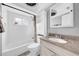 Clean bathroom with white subway tile and granite vanity at 4543 Indianapolis Ne St, St Petersburg, FL 33703