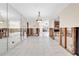 Dining room with exposed framing and mirrored wall during renovation at 4543 Indianapolis Ne St, St Petersburg, FL 33703