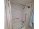 Clean bathroom with a shower and tub at 4920 Locust Ne St # 203, St Petersburg, FL 33703