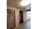 Building hallway with elevator and laundry at 4920 Locust Ne St # 203, St Petersburg, FL 33703