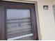 Exterior condo front door with screen at 4920 Locust Ne St # 203, St Petersburg, FL 33703