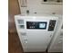 Commercial dryer in the laundry room at 4920 Locust Ne St # 203, St Petersburg, FL 33703