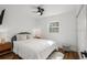 Charming bedroom with hardwood floors and a ceiling fan at 5118 Murray Hill Dr, Tampa, FL 33615