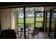 Relaxing screened porch overlooking waterfront view at 6158 Palma Del Mar S Blvd # 116, St Petersburg, FL 33715