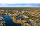 Aerial view highlighting a townhouse community's location and waterfront access at 6320 Grand Bahama Cir # 6320, Tampa, FL 33615