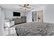 Spacious main bedroom with dresser and en-suite bathroom at 6320 Grand Bahama Cir # 6320, Tampa, FL 33615