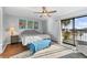 Main bedroom with water views and private balcony at 6320 Grand Bahama Cir # 6320, Tampa, FL 33615