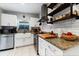 Modern kitchen with farmhouse sink and stainless steel appliances at 6405 Julie St, Tampa, FL 33610