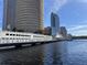 View of Tampa's Riverwalk with modern buildings in the background at 6405 Julie St, Tampa, FL 33610