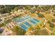 Aerial view of park with tennis and basketball courts at 6405 Julie St, Tampa, FL 33610