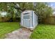 Well-maintained storage shed in the backyard at 6405 Julie St, Tampa, FL 33610