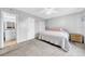 Bright bedroom with a queen bed and ensuite bathroom at 6960 20Th N Ave # 307, St Petersburg, FL 33710