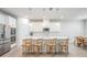 Modern kitchen with white cabinets and quartz countertops at 7878 Greenway Ave, Wesley Chapel, FL 33544