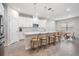 Modern kitchen with white cabinets and quartz countertops at 7878 Greenway Ave, Wesley Chapel, FL 33544