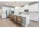 Modern kitchen with white cabinets and quartz countertops at 7878 Greenway Ave, Wesley Chapel, FL 33544