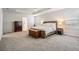 Large main bedroom with ample space and en-suite bathroom access at 7878 Greenway Ave, Wesley Chapel, FL 33544