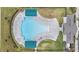 Community pool with surrounding lounge chairs and cabanas at 7878 Greenway Ave, Wesley Chapel, FL 33544