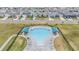 Community pool with plenty of lounge chairs for residents at 7878 Greenway Ave, Wesley Chapel, FL 33544