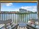 Spacious balcony overlooking waterfront with partial view of marina at 7930 Sun Island S Dr # 305, South Pasadena, FL 33707