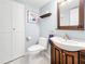 Powder room with single vanity and toilet at 7930 Sun Island S Dr # 305, South Pasadena, FL 33707