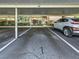 Covered parking spot conveniently located near building entrance at 7930 Sun Island S Dr # 305, South Pasadena, FL 33707