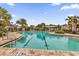 Resort-style pool with ample deck space for lounging at 8332 Enclave Way # 101, Sarasota, FL 34243