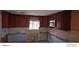 Renovated kitchen with dark wood cabinets and tile at 8504 42Nd N Ave, St Petersburg, FL 33709