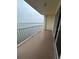 Private balcony with water views and sliding doors at 8800 Bay Pines Blvd # 220, St Petersburg, FL 33709