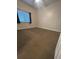 Carpeted bedroom with window and ceiling fan at 8800 Bay Pines Blvd # 220, St Petersburg, FL 33709