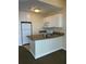 Efficient galley kitchen with granite countertops at 8800 Bay Pines Blvd # 220, St Petersburg, FL 33709