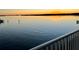 Stunning sunset over calm water, seen from private balcony at 8800 Bay Pines Blvd # 220, St Petersburg, FL 33709